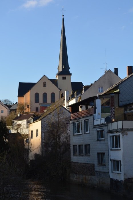 houses against the background of the church building