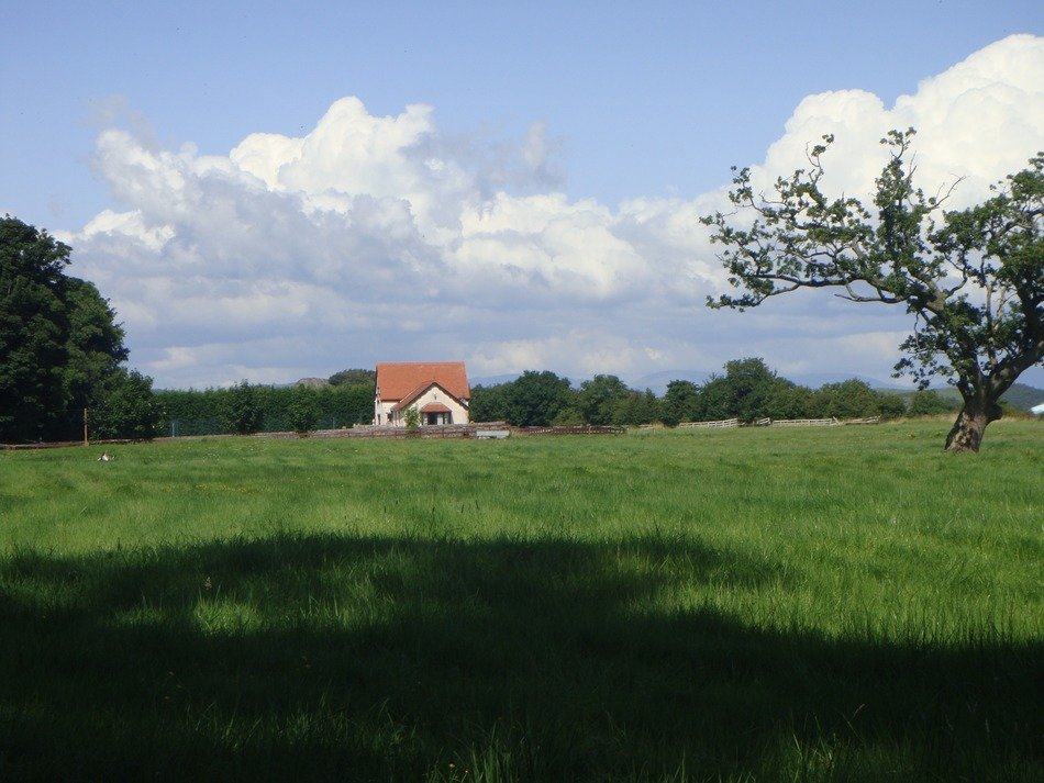 lonely building in countryside at summer, uk