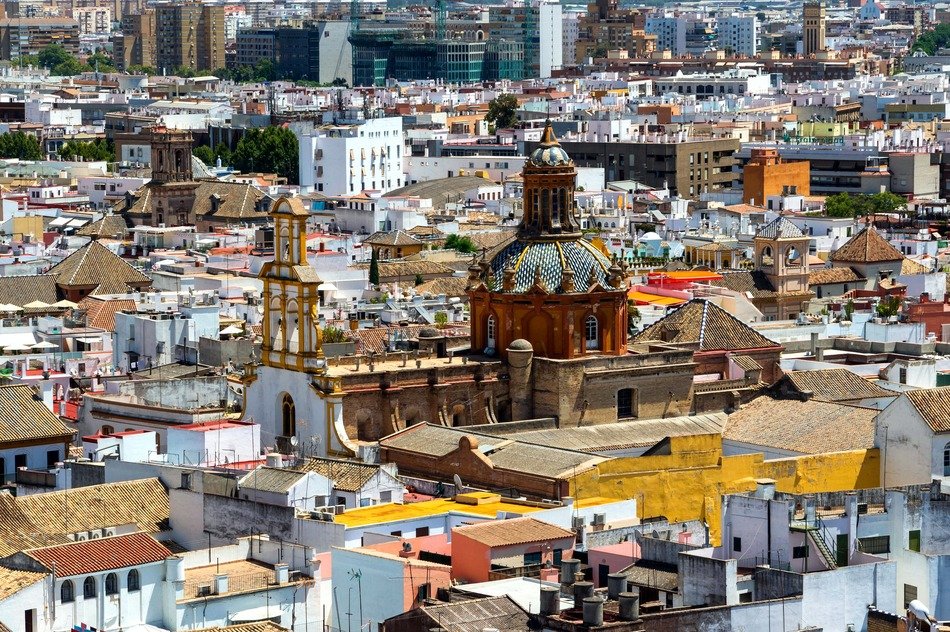 aged church in top view of city, spain, seville