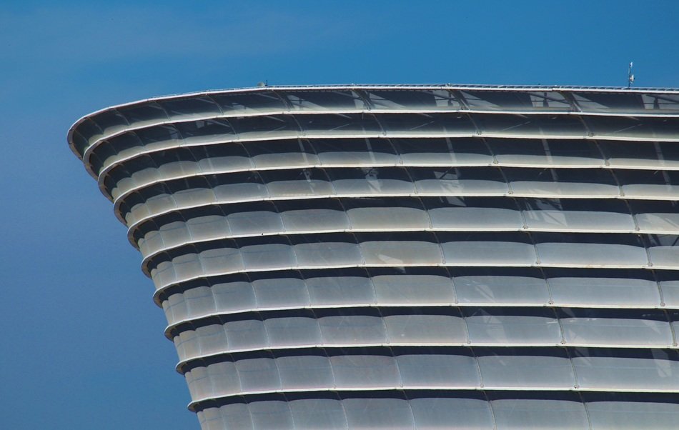 Cape-shaped building