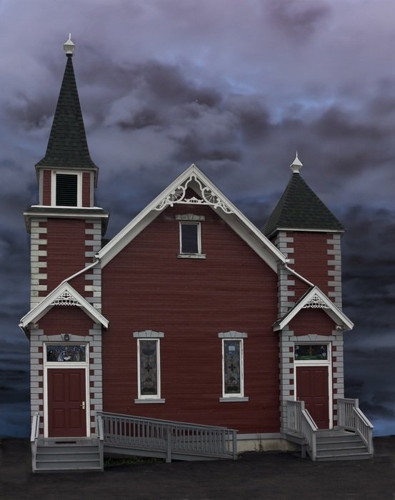 Picture of the red and white church building