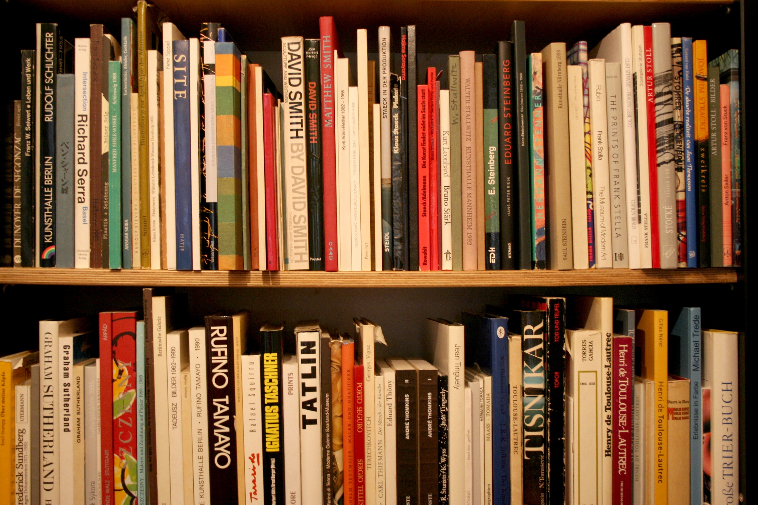 Books on shelves in the library free image download