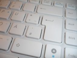 photo of part of a white computer keyboard