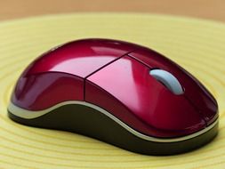 red and shiny computer mouse