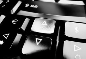 Closeup photo of black and white keyboard