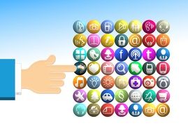 hand touchs colorful social media icons