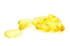 vitamins in yellow capsules