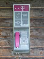 telephone booth with pink telephone