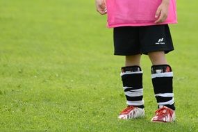 little football player on the field