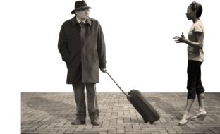 talking woman and man with the suitcase