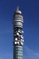 Tower with antennas against the blue sky