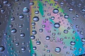 water drops oncompact disk surface