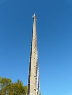 radio antenna on a background of blue sky