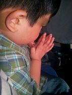 small boy pray