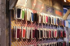 colorful iphone cases on stand