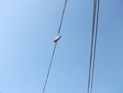 sneakers on telephone wires