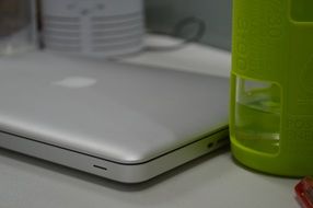 computer on the table in the conference room