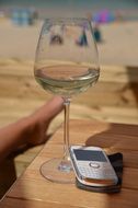 phone and wine glass