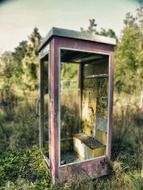 phone booth amidst nature