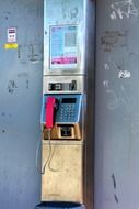 public telephone in an unfavorable light