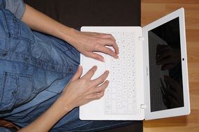 female person working on the laptop