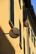 wall sign with red phone