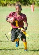 small black football player