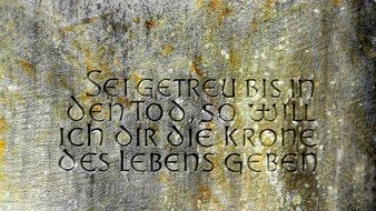 bible verse on a stone tablet