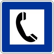 road traffic sign of a nearby telephone