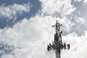 tower with antennas against the sky