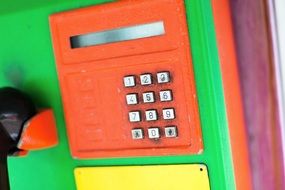 color phone in a phone booth in Thailand