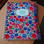 notebook with colorful flowers