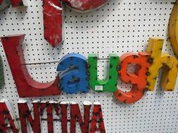 colored letters on a magnetic board