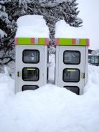 telephone booths in deep snow in austria