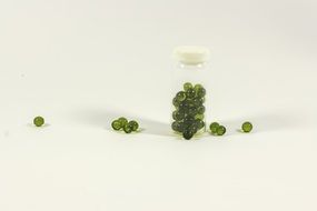 Transparent green capsules with medicine