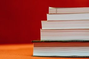 books stack at red background