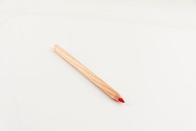 one wooden red pencil