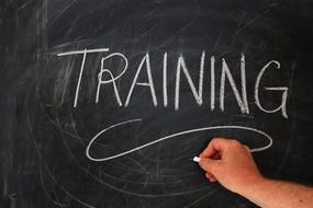 inscription TRAINING on a blackboard