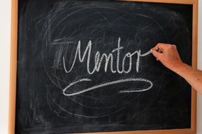 inscription MENTOR on a blackboard