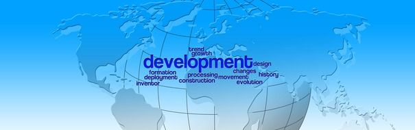 Development sign on the globe