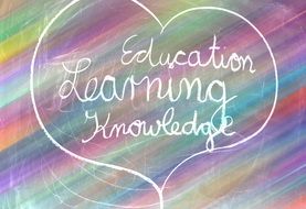 On the education board, a heart with the inscription "education learning knowledge"