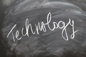 inscription TECHNOLOGY on a blackboard