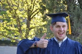 graduated smiling student