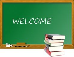 welcome written on the blackboard and books