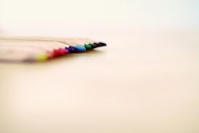 Colorful colored pencils at row, shallow depth of field