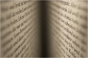 book read scrolled pages macro photo