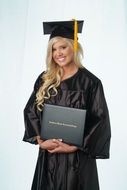 college graduate with a diploma in her hands