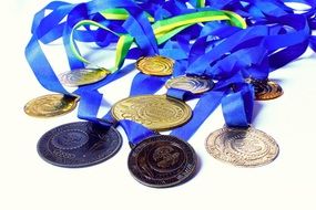 gold, silver and bronze medals on ribbons