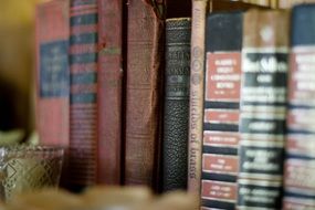 antique books close-up on blurred background