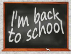 sign back to school on a board